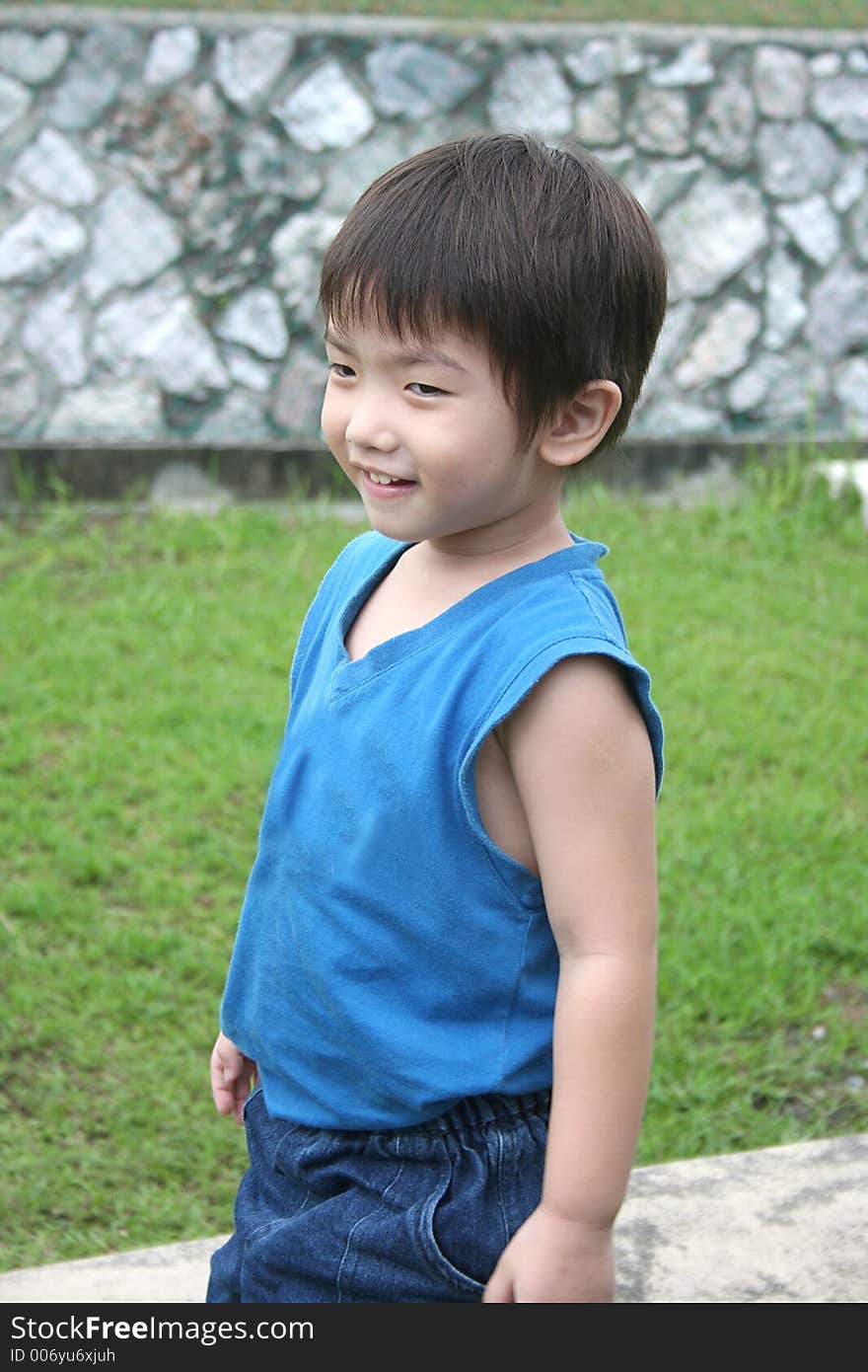 Boy in blue singlet