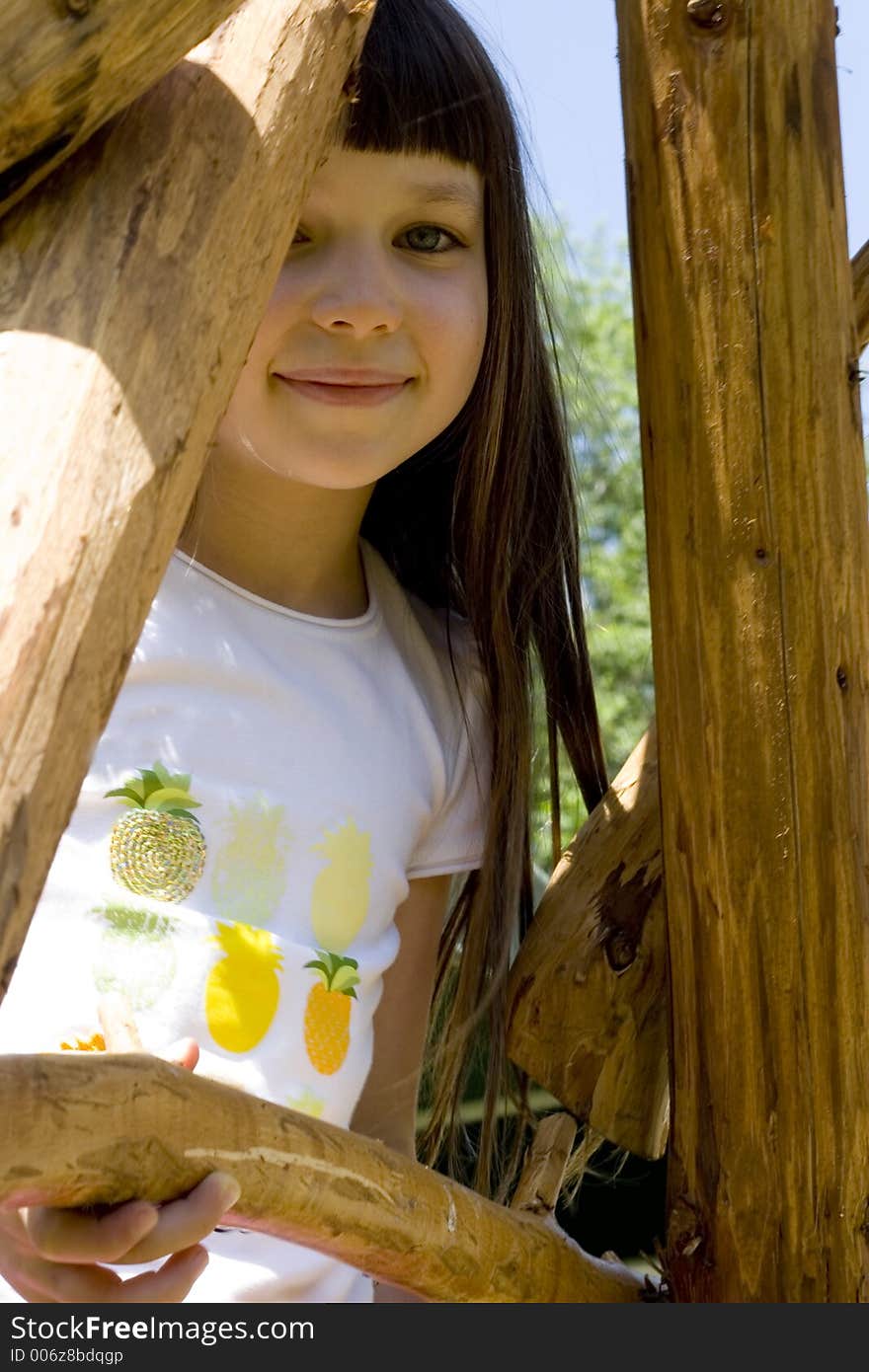 Girl smiling and looking to her mother