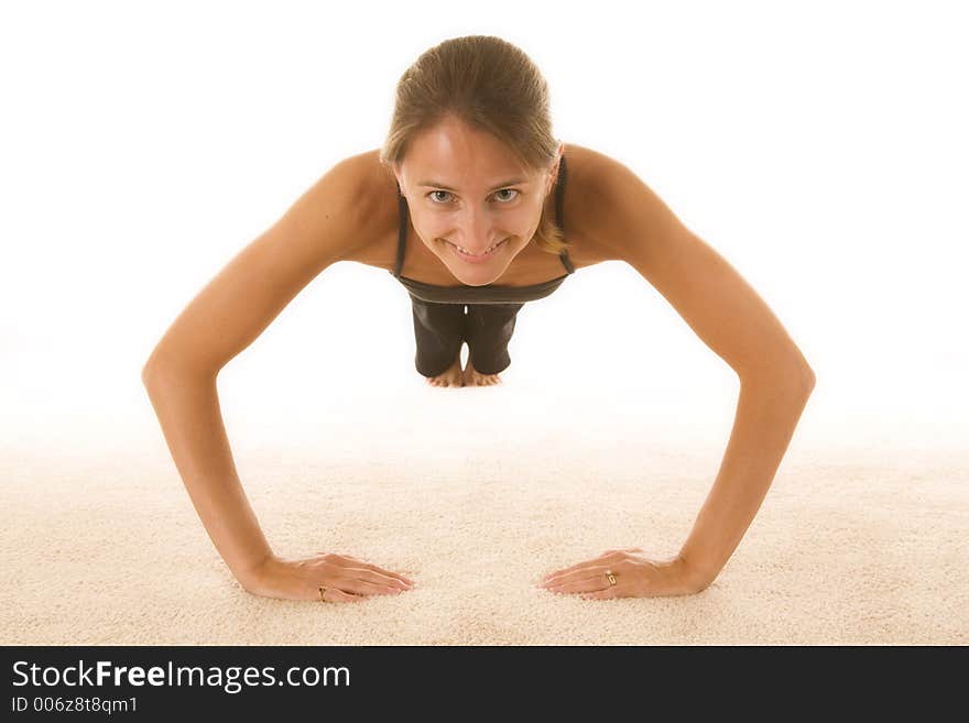 Beautiful young woman wearing workout clothes. Beautiful young woman wearing workout clothes.