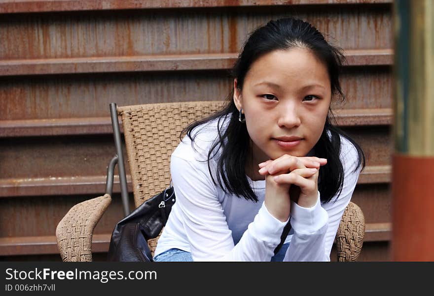 Pretty Korean woman with serious expression