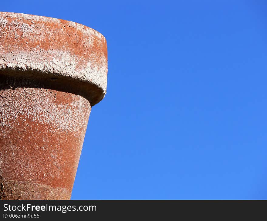 An old weathered terracotta pot.