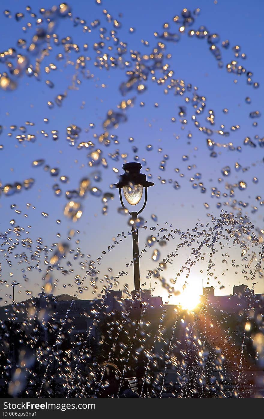 Fontana water drops  little blurred in sunset. Fontana water drops  little blurred in sunset