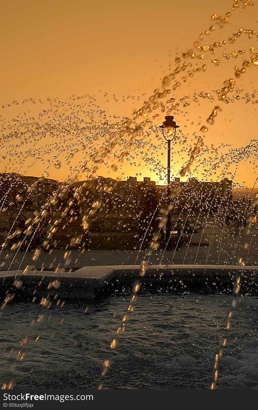 Fontana water drops  little blurred in sunset. Fontana water drops  little blurred in sunset