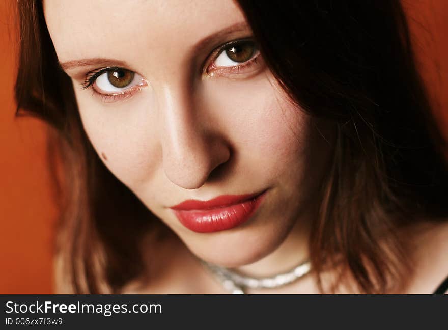 A close-up portrait of a beautiful young woman. A close-up portrait of a beautiful young woman.