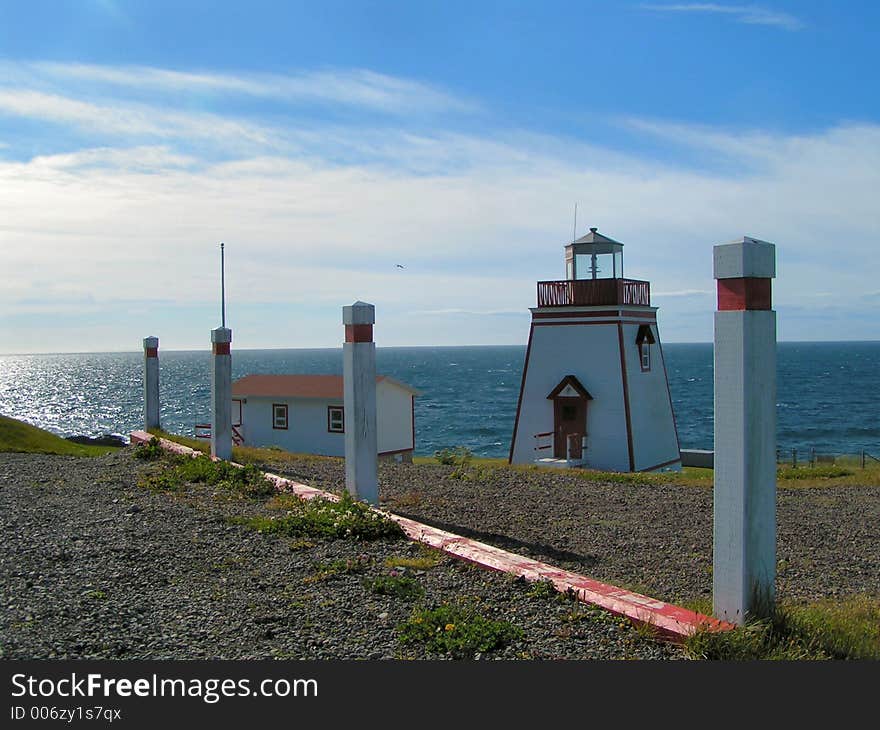 A lighthouse guides warns ships of land