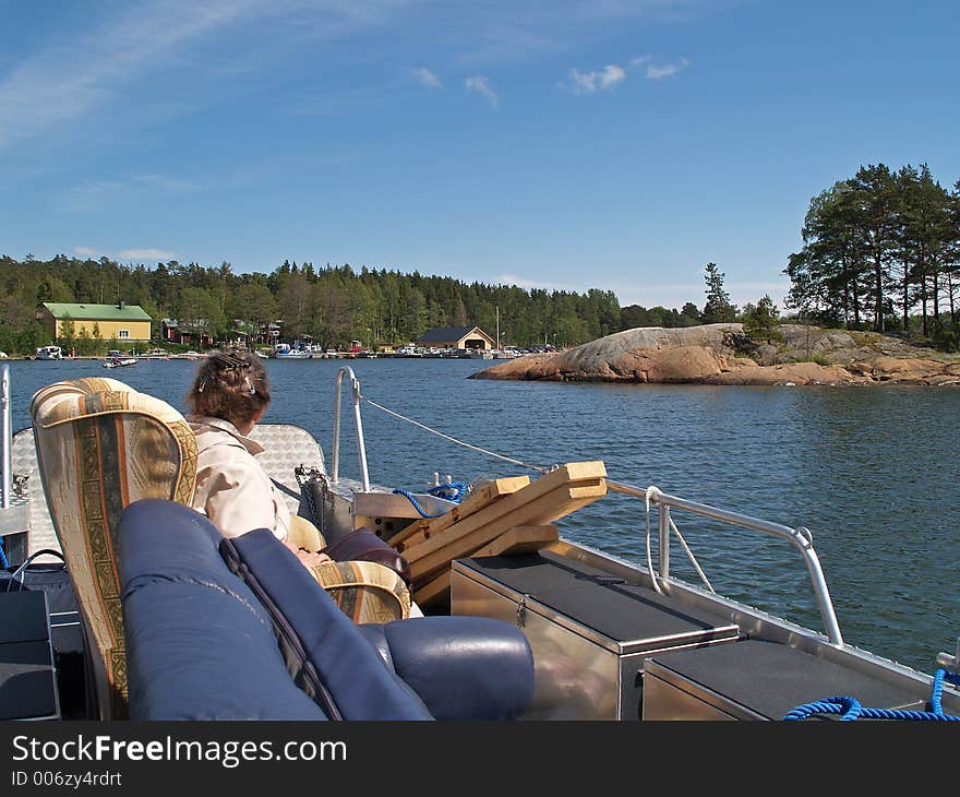 Sea taxi transporting goods in a bay