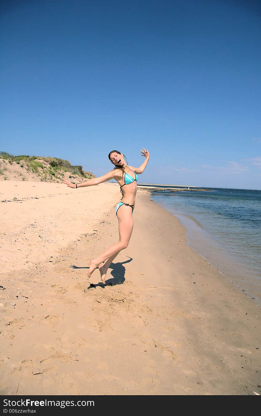 Young woman jumping for joy. Young woman jumping for joy