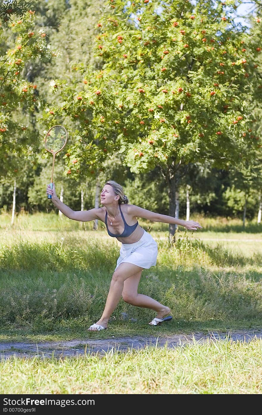 The Woman Plays Badminton