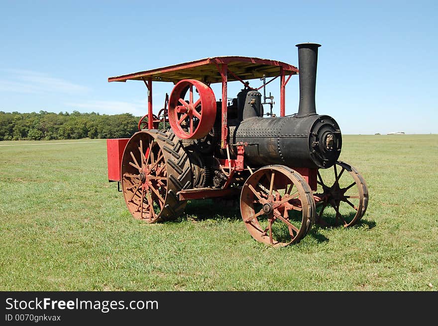 Old tractor, no longer in use, on display at a local park in Chilicothe, IL. Old tractor, no longer in use, on display at a local park in Chilicothe, IL.