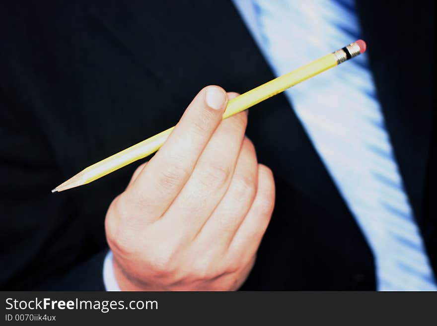 Business man with pencil