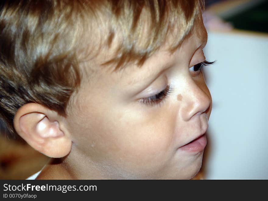 Boy with long eyelashes and big brown eyes