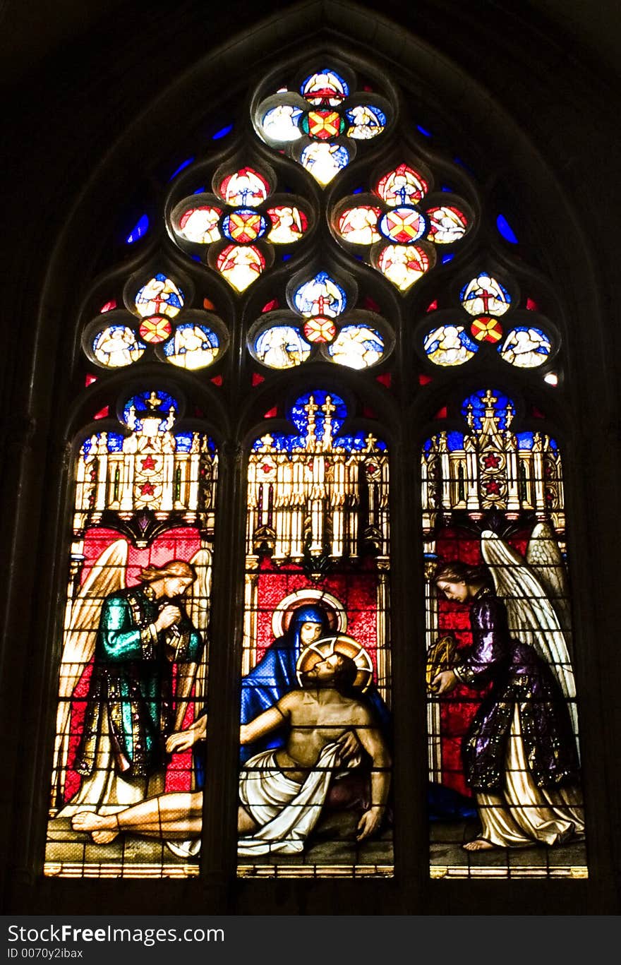 Stained Glass Portraying the Crucifixion. Stained Glass Portraying the Crucifixion