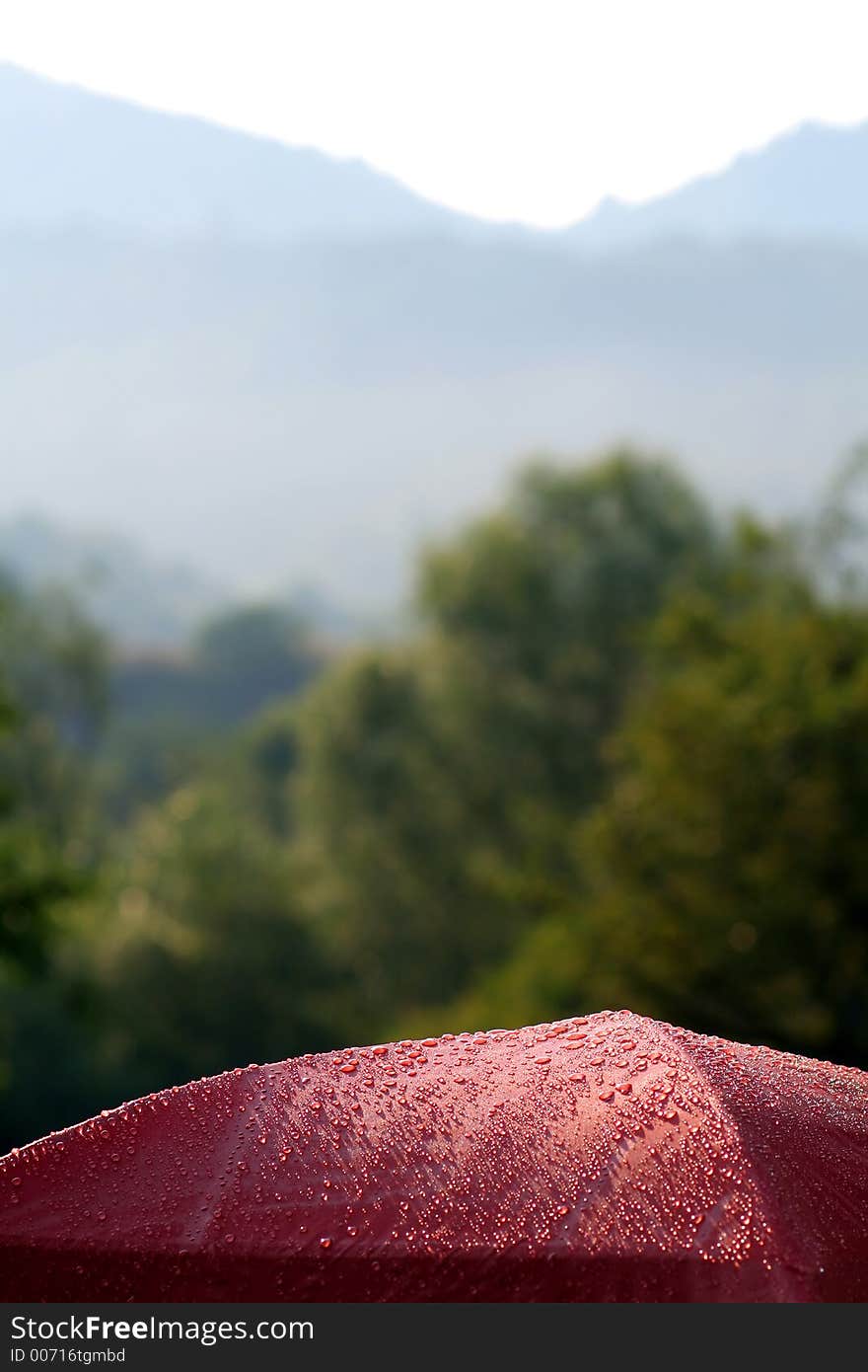 Tent in the morning sun with water drops