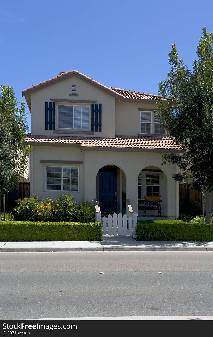 Exterior shot of a small, urban, custom Home. Exterior shot of a small, urban, custom Home.