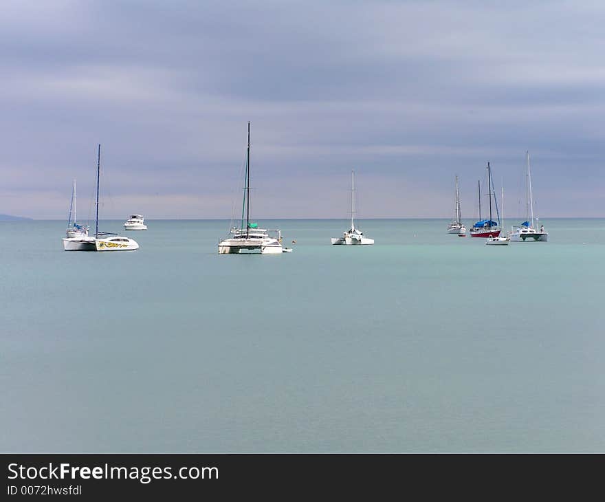 Beautiful view of a tropical bay with katamarans