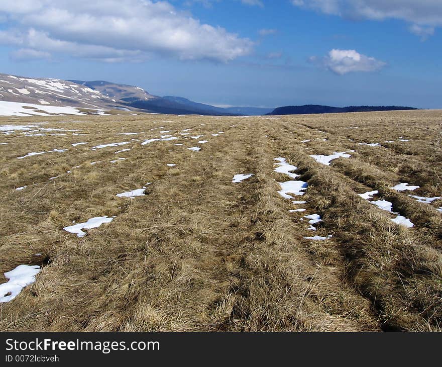 Yellow grassland and mountain. Yellow grassland and mountain