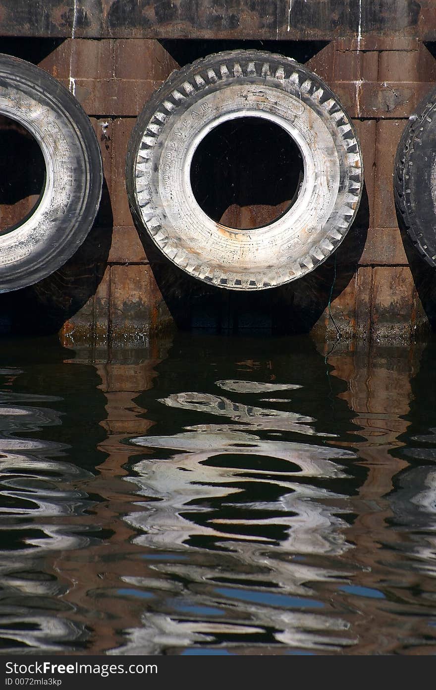 Tire in harbor  reflexions in denmark. Tire in harbor  reflexions in denmark