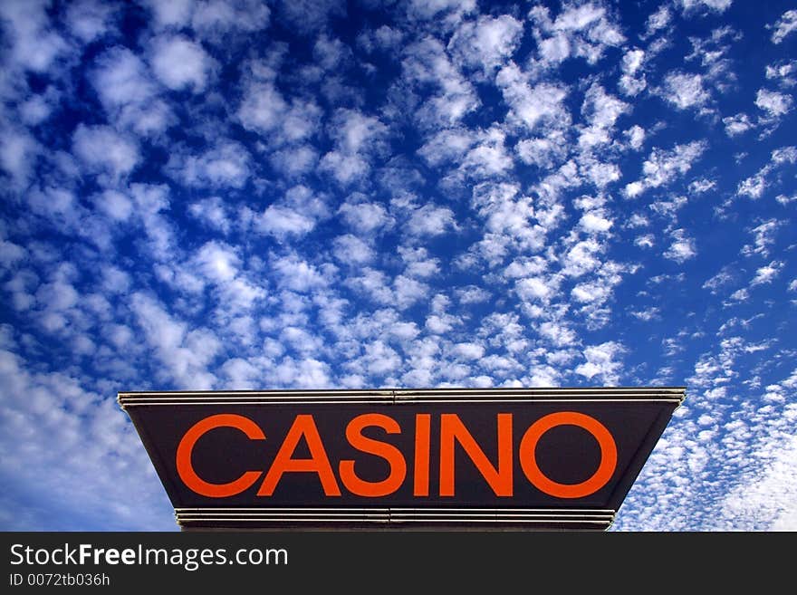 Casino-sign under a deep blue sky with clouds. Casino-sign under a deep blue sky with clouds