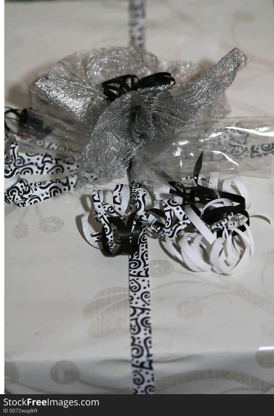 A black and white wrapped gift