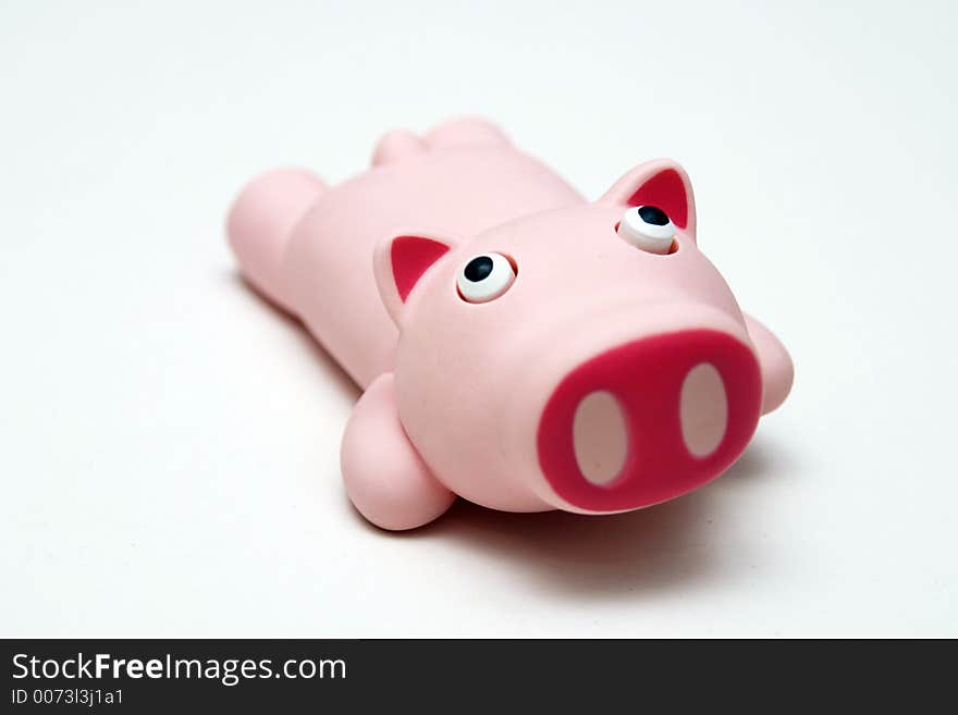 A Cute Pink Rubber Piggy Wrist rest against a white background