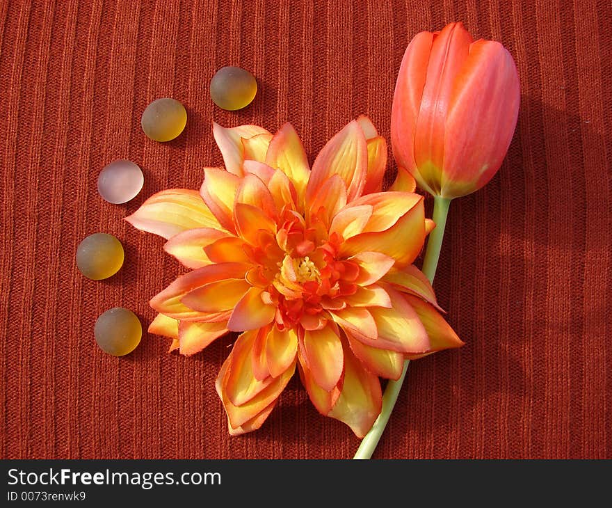 Orange Tulip, Artificial Orange Flower & Glass Pebbles. Orange Tulip, Artificial Orange Flower & Glass Pebbles