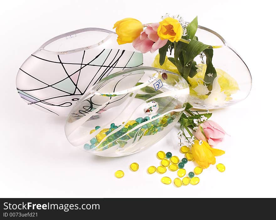 Still-life with flowers in glass vase at white background. Still-life with flowers in glass vase at white background