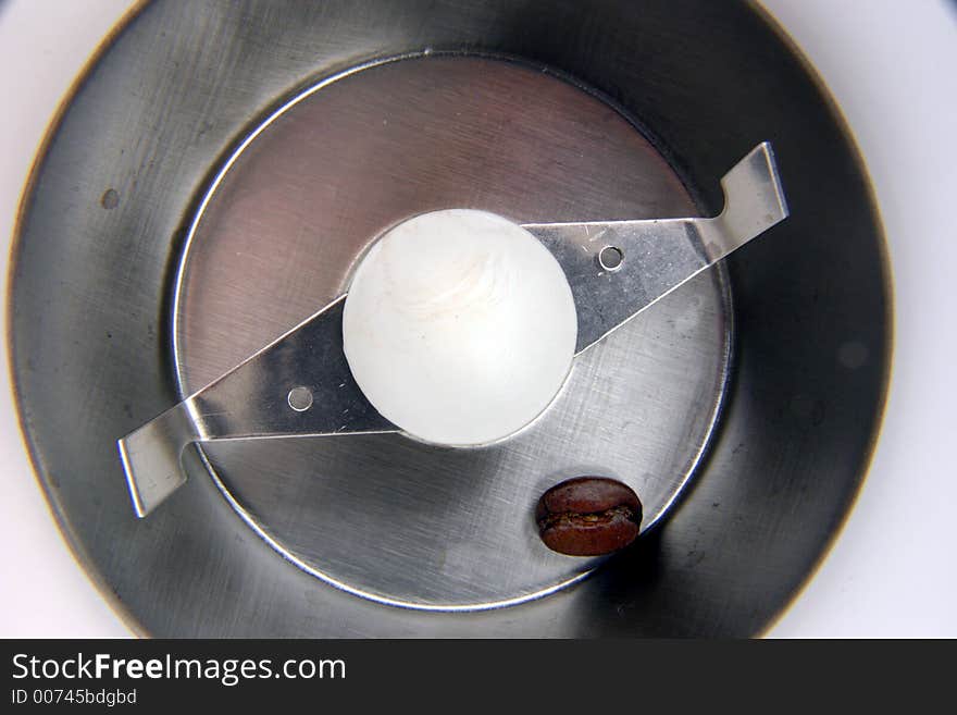 A single coffee bean is all that is left to grind in this appliance. A single coffee bean is all that is left to grind in this appliance.