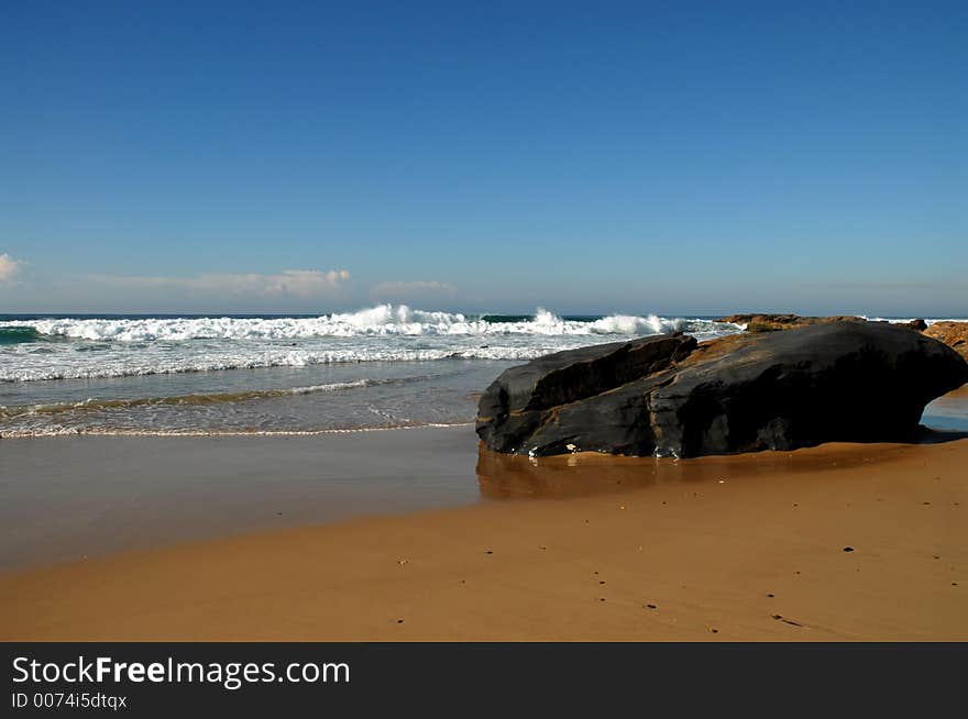 Large Rock On The Sand On A Beach In Australia