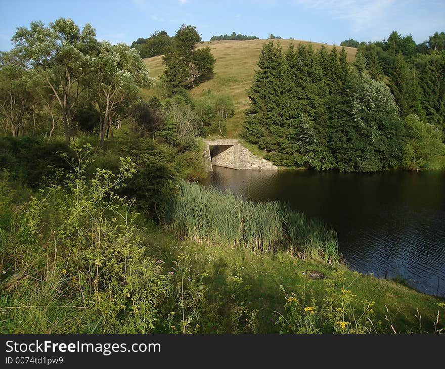 It is a picture taken from Trei Ape Lake, in Romania. in a avery pitoresque side of the country. It is a picture taken from Trei Ape Lake, in Romania. in a avery pitoresque side of the country