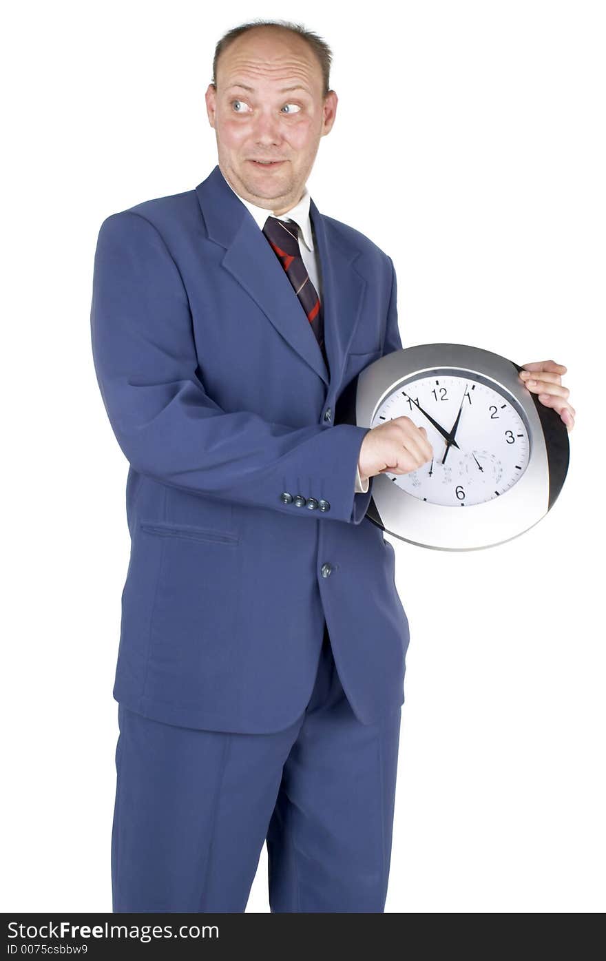 Businessman holding and looking at a clock. Businessman holding and looking at a clock