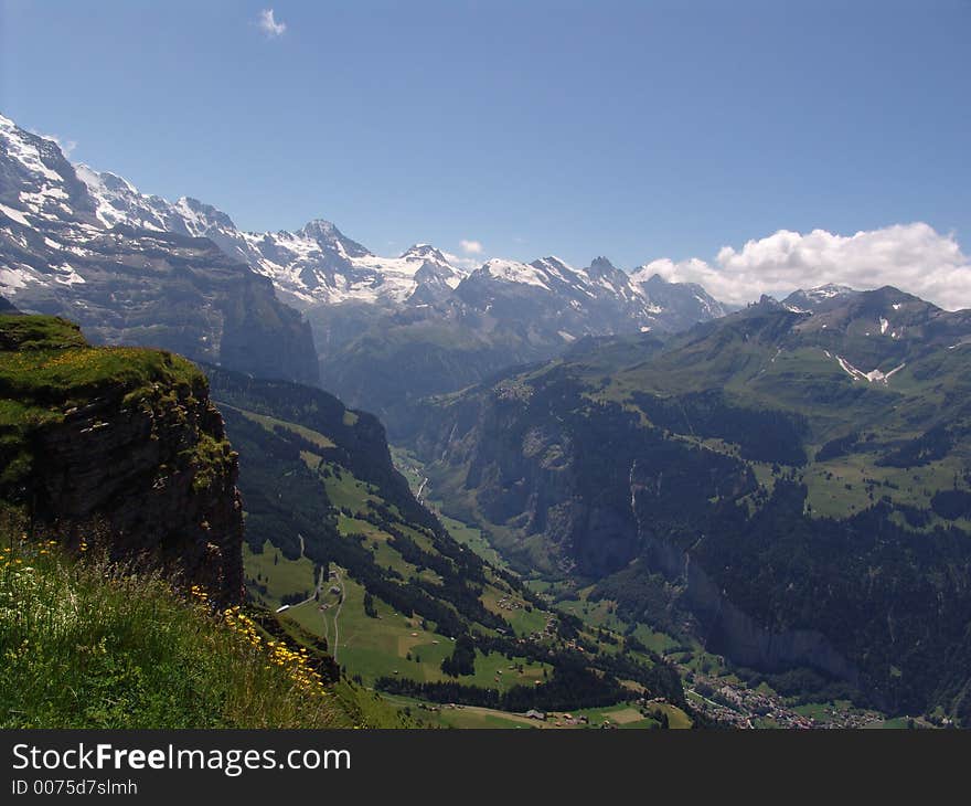 A panarama of the Lauterbrunnen Valey taken above Wegen, Switzerland.  the valley has 72 waterfalls in it. A panarama of the Lauterbrunnen Valey taken above Wegen, Switzerland.  the valley has 72 waterfalls in it.