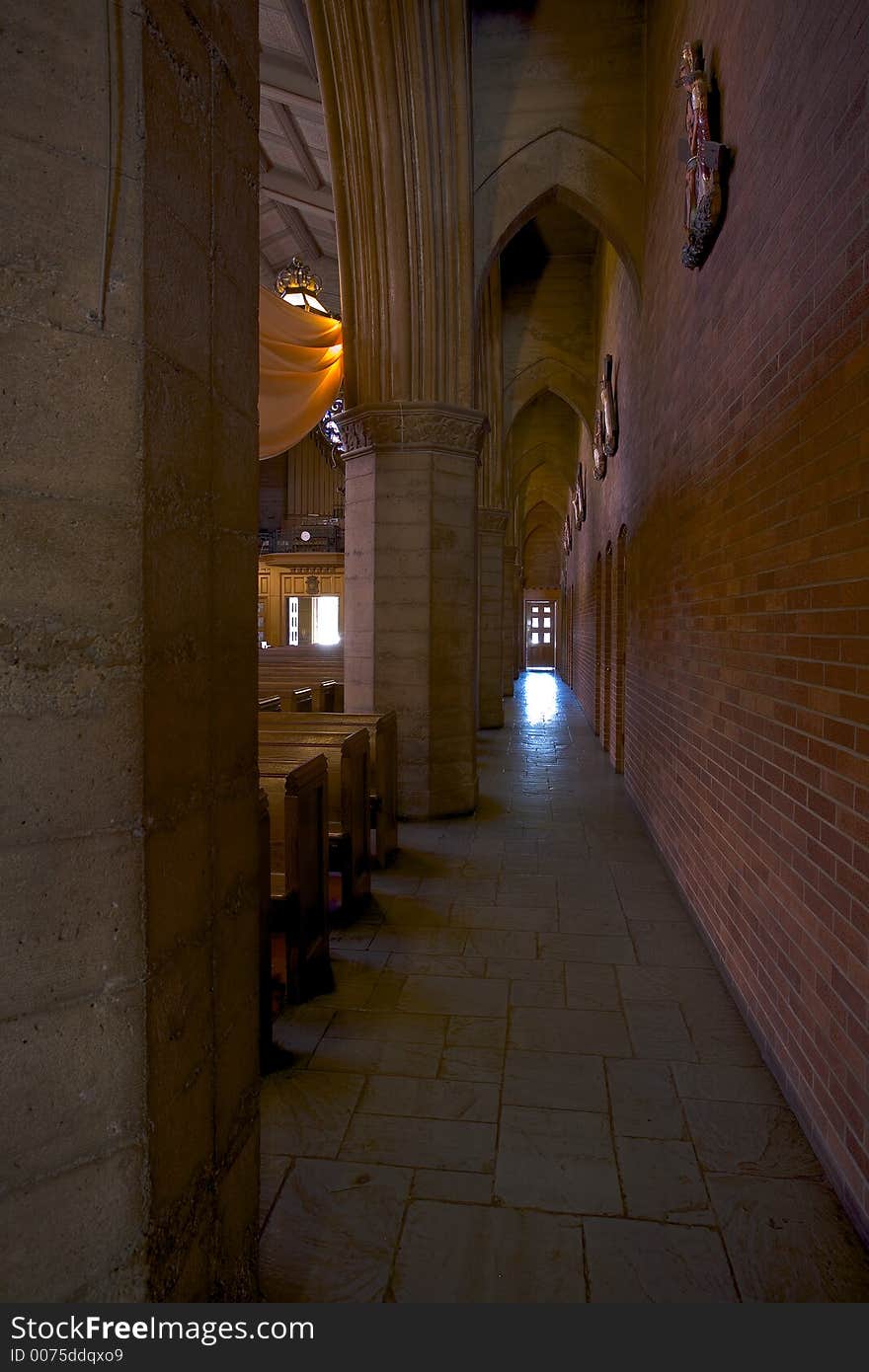 Interior shot of a hallway inside the sanctuary of St. Jarlath Catholic Church in Oakland, CA. Interior shot of a hallway inside the sanctuary of St. Jarlath Catholic Church in Oakland, CA.