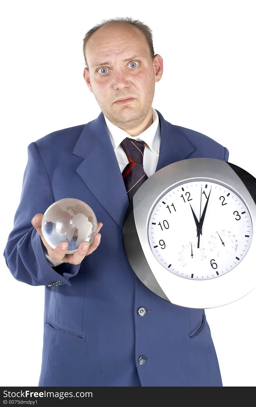 Businessman holding and looking at a clock. Businessman holding and looking at a clock