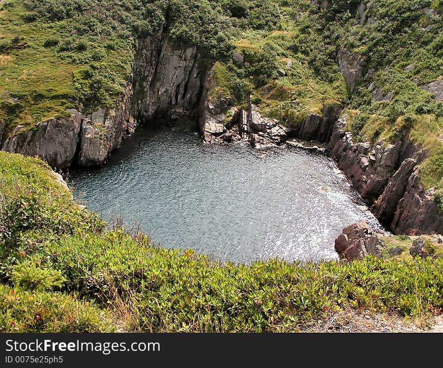 A cove encircled by cliffs. A cove encircled by cliffs