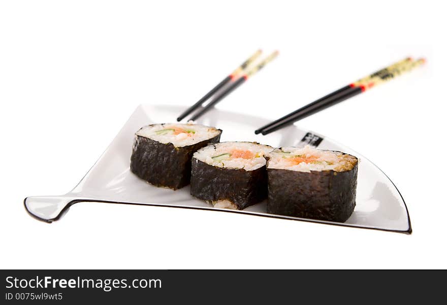 Sushi on a plate. Isolated on a white background.