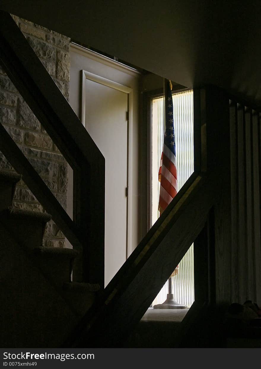 The flag seems to be framed by the stairways. The flag seems to be framed by the stairways.