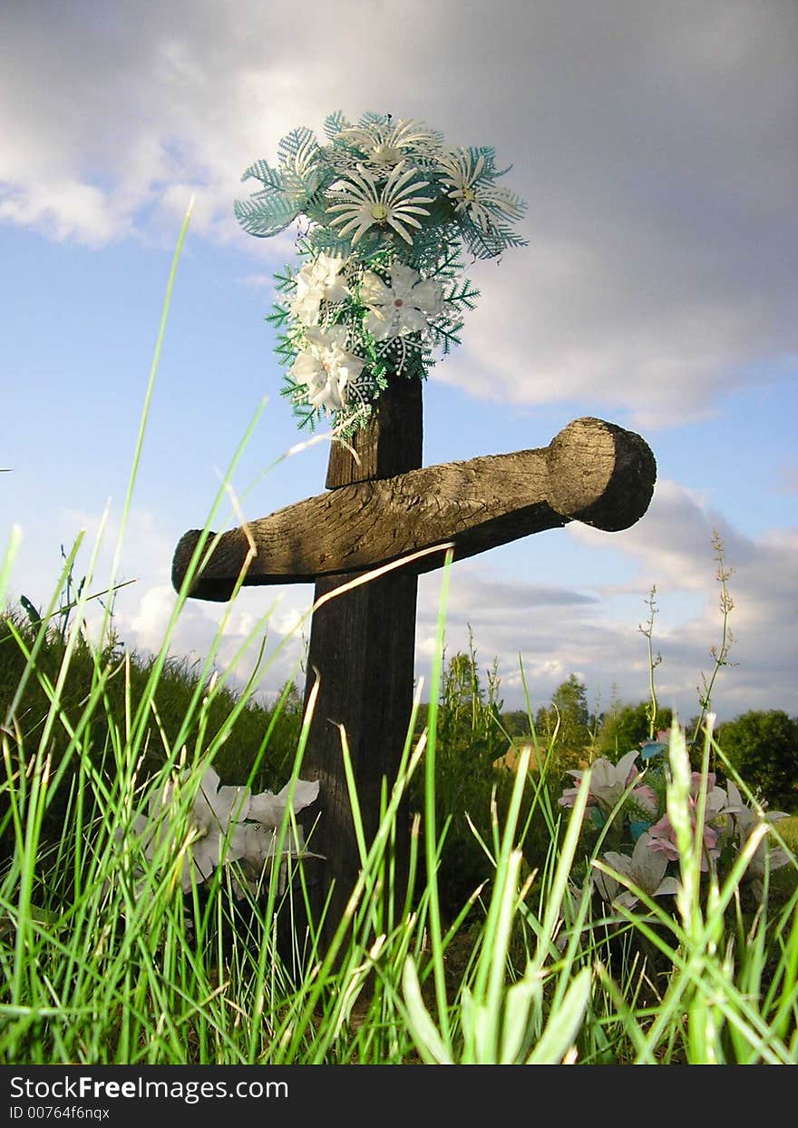 This crucifix is a typical grave monument of catholic village people in Ptrukša in East-Slovakia. It is made of wood and represents the beauty of the simply forms. This crucifix is a typical grave monument of catholic village people in Ptrukša in East-Slovakia. It is made of wood and represents the beauty of the simply forms.