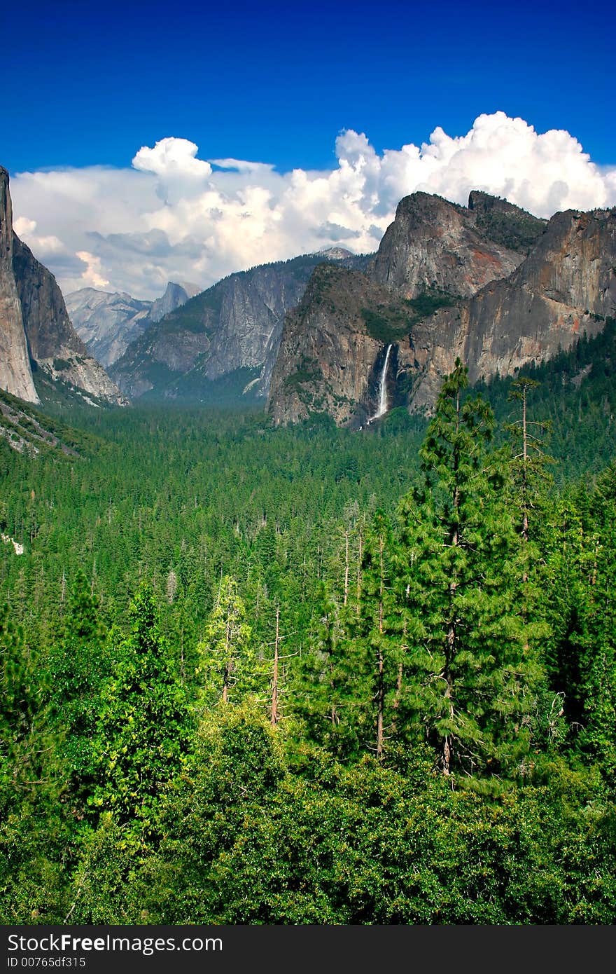 Tunnel View at Yosemite National park offers a beautiful panorama of Yosemite Valley with El Capitan on the left, Bridalveil Fall on the right and Half Dome in the center. Tunnel View at Yosemite National park offers a beautiful panorama of Yosemite Valley with El Capitan on the left, Bridalveil Fall on the right and Half Dome in the center.