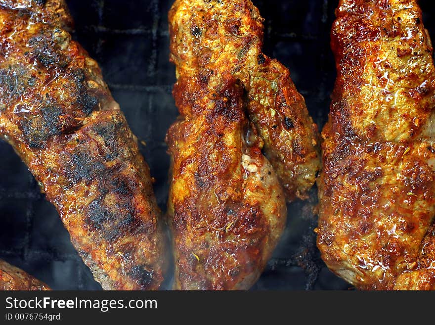 Juicy pieces of grilled meat (3)