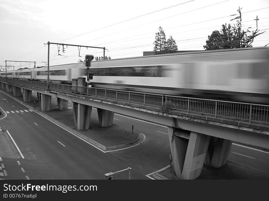 Long passing train on bridge. Long passing train on bridge