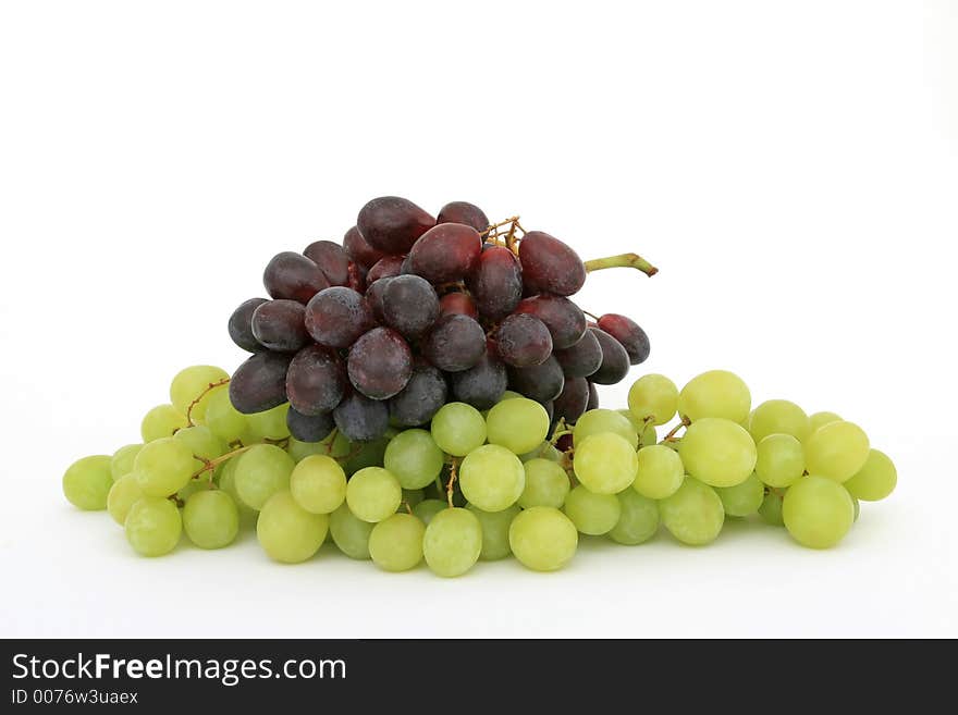 Red and green grapes, isolated on white, copy space