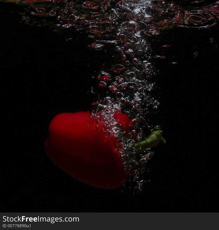 Red Fruit In Waterfall