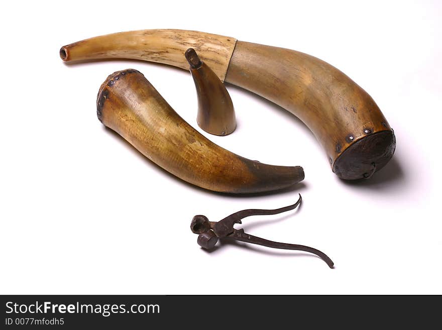 Two powder horns for black powder muskets, antique, and a percussion cap holder, all very. Two powder horns for black powder muskets, antique, and a percussion cap holder, all very