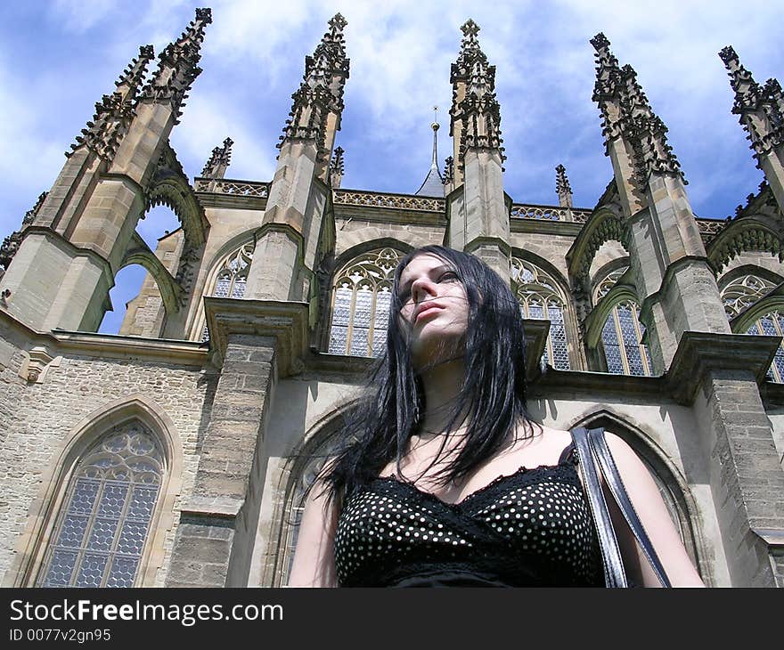 Gothic girl and a cathedral