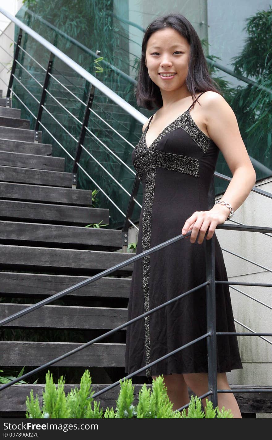 Gorgeous Korean woman wearing a black dress