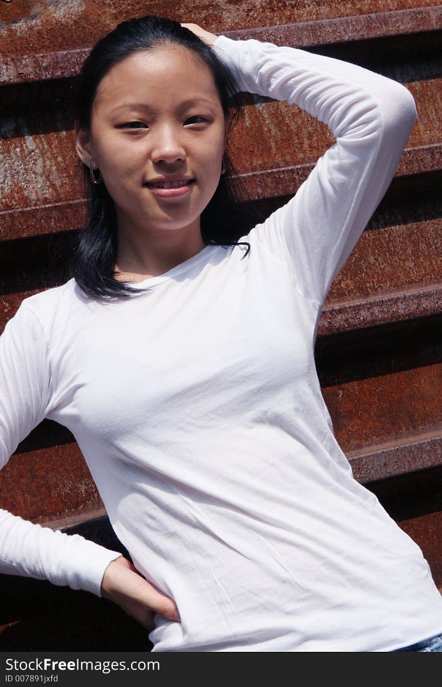 Beautiful Korean woman in a white shirt