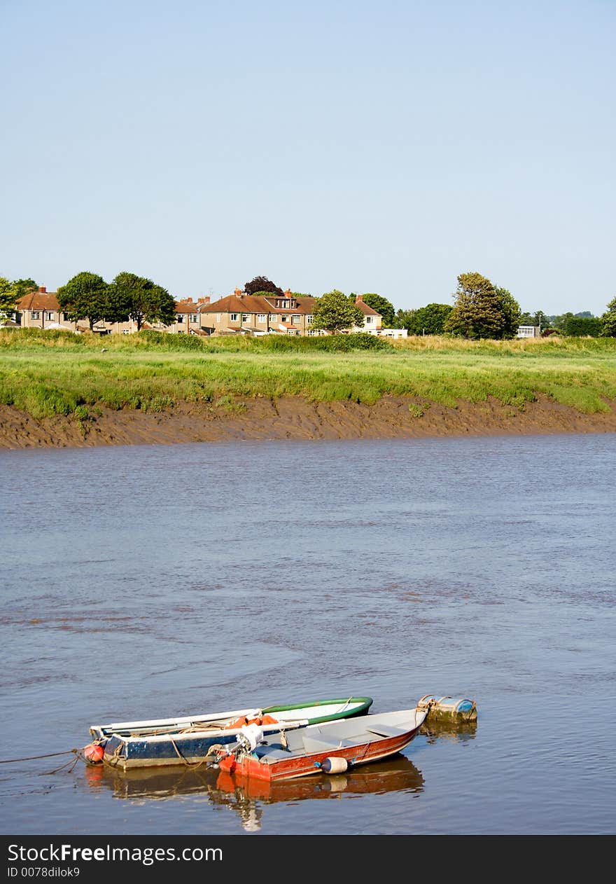 Two rowing boats on a river