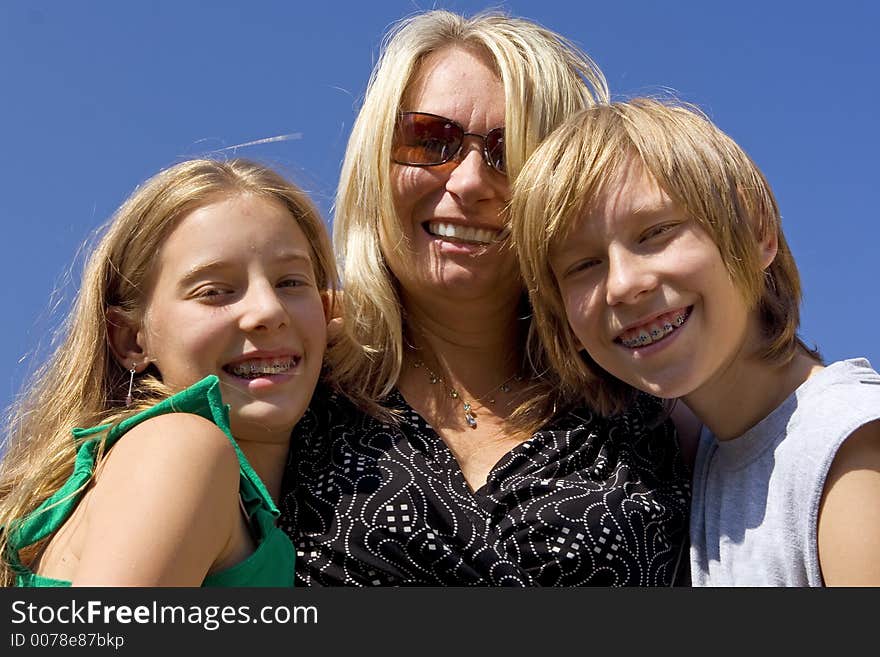 Happy family on blue sky. Happy family on blue sky