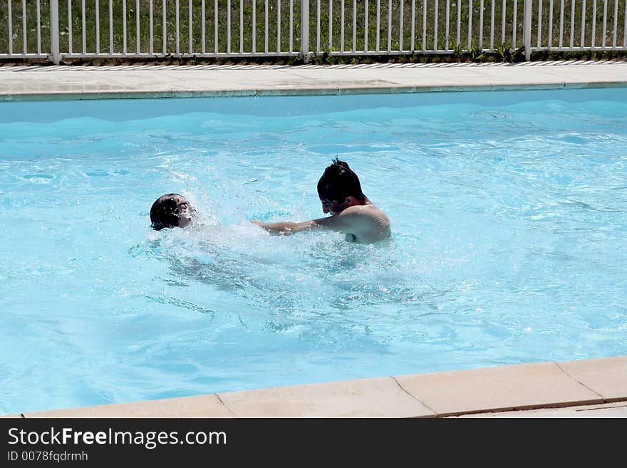 Kids playing in the pool