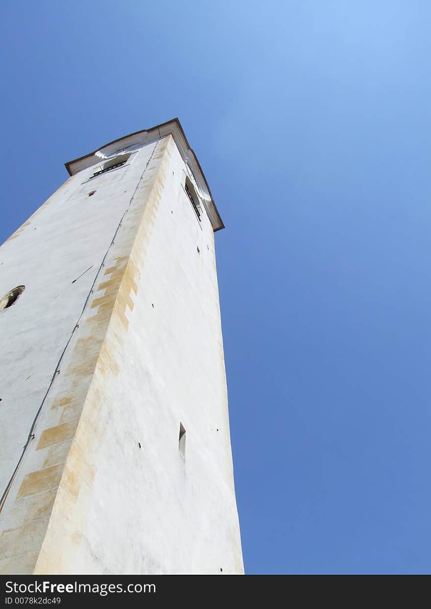 Christian church steeple on a crystal blue sky